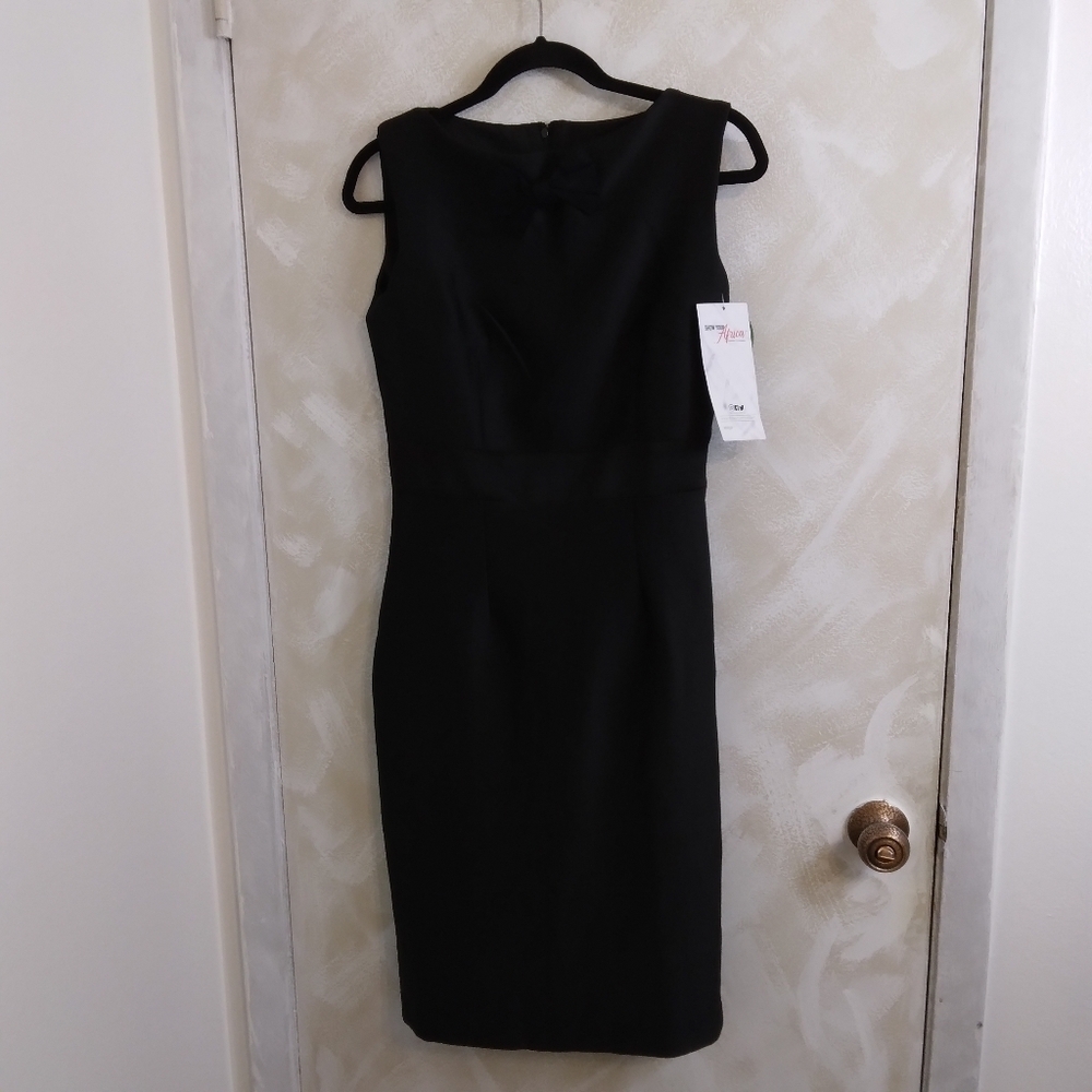 Size M EKO & CO Black Dress Bow boat neck back zip back slit Fitted